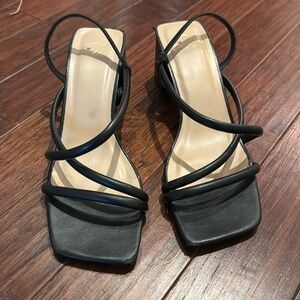 Black strapped kitten heels